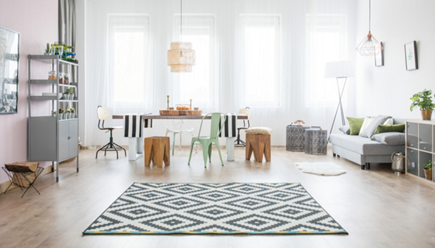 Area rugs can  strikingly accent the color of your hardwood floors.