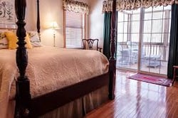 bedroom with beautiful hardwood flooring