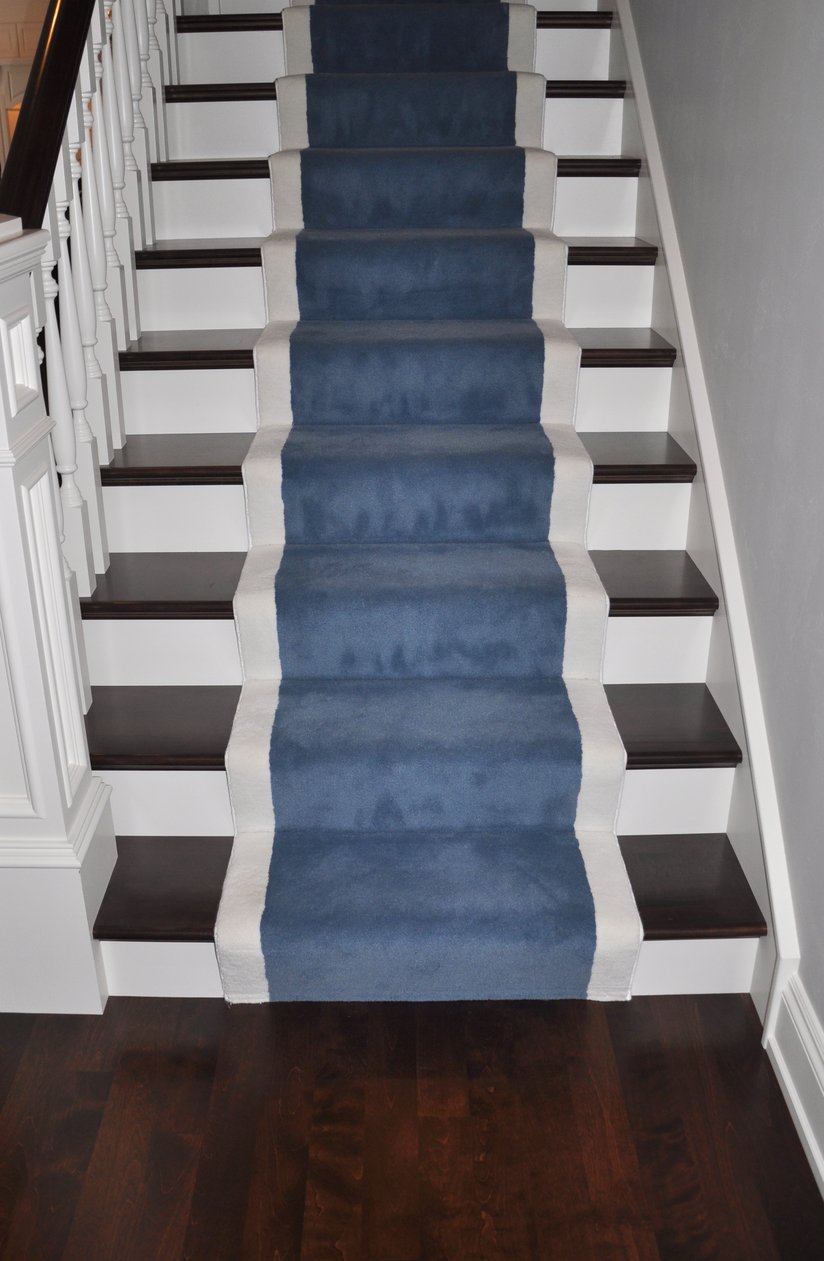 Carpet runners help create a flow between hardwood floors and hardwood staircases.