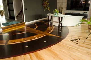 Compass themes are a popular choice for hardwood floor medallions.